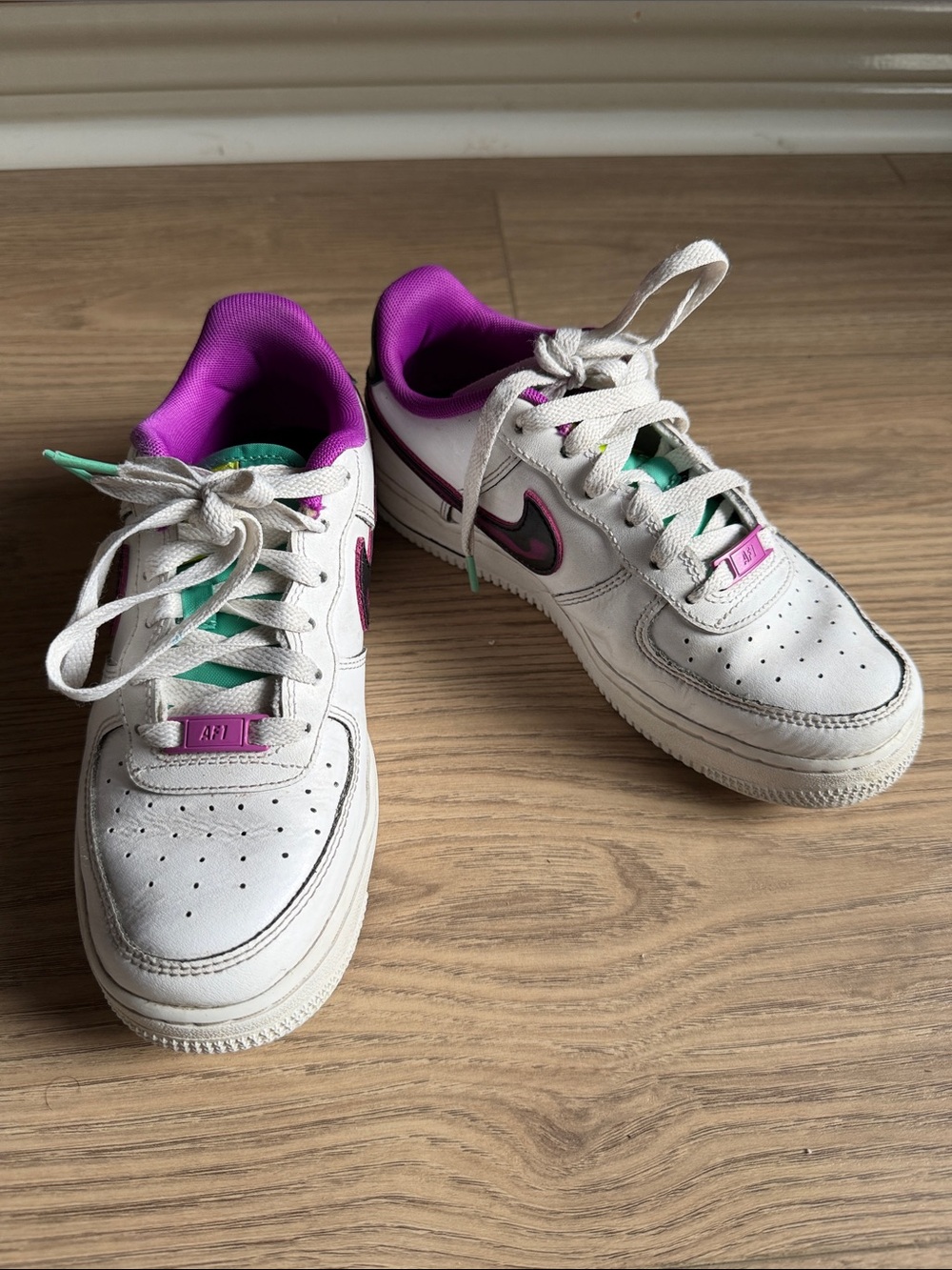 Nike White Air Force 1 Low with Purple & Teal Accents